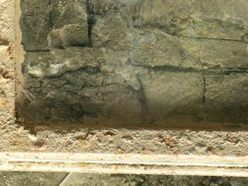 III.10, Herculaneum, May 2005.  Press, with carbonised wood. Photo courtesy of Nicolas Monteix.